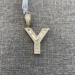 Charm 10k Yellow Gold With Round And Baguette diamond