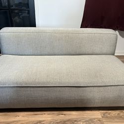 CB2 Lenyx Stone Armless Loveseat Sofa