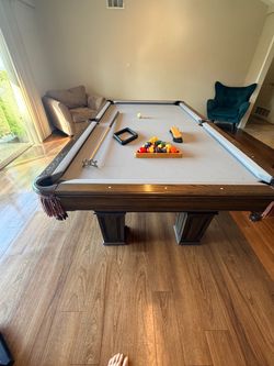 8ft Pool Table with Corner cue Rack   $250.00 OBO