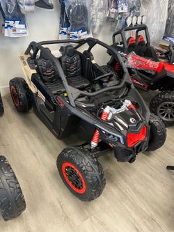 CanAm 4X4 kids power wheels w/remote
