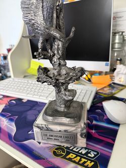 Michael Ricker pewter sculpture is a registered limited-edition piece titled "The American Eagles."
