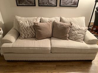 Beige Couch & Rug