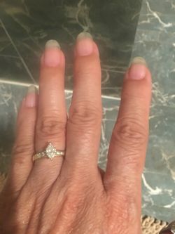 Genuine diamond ring , Center 1/2 ct plus 6 diamonds 14 k