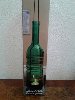 New. Bottle Candle holder . New. $4