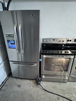 Maytag Stainless Steel French Door Refrigerator and stove