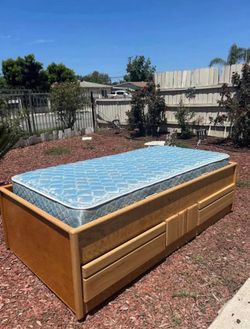 Twin bed with drawers