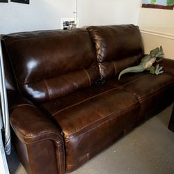 Like New Dual Power Leather Reclining Sofa