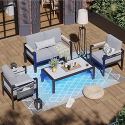 Patio Set With Loveseat,  2 Chairs,  And LED Coffee Table