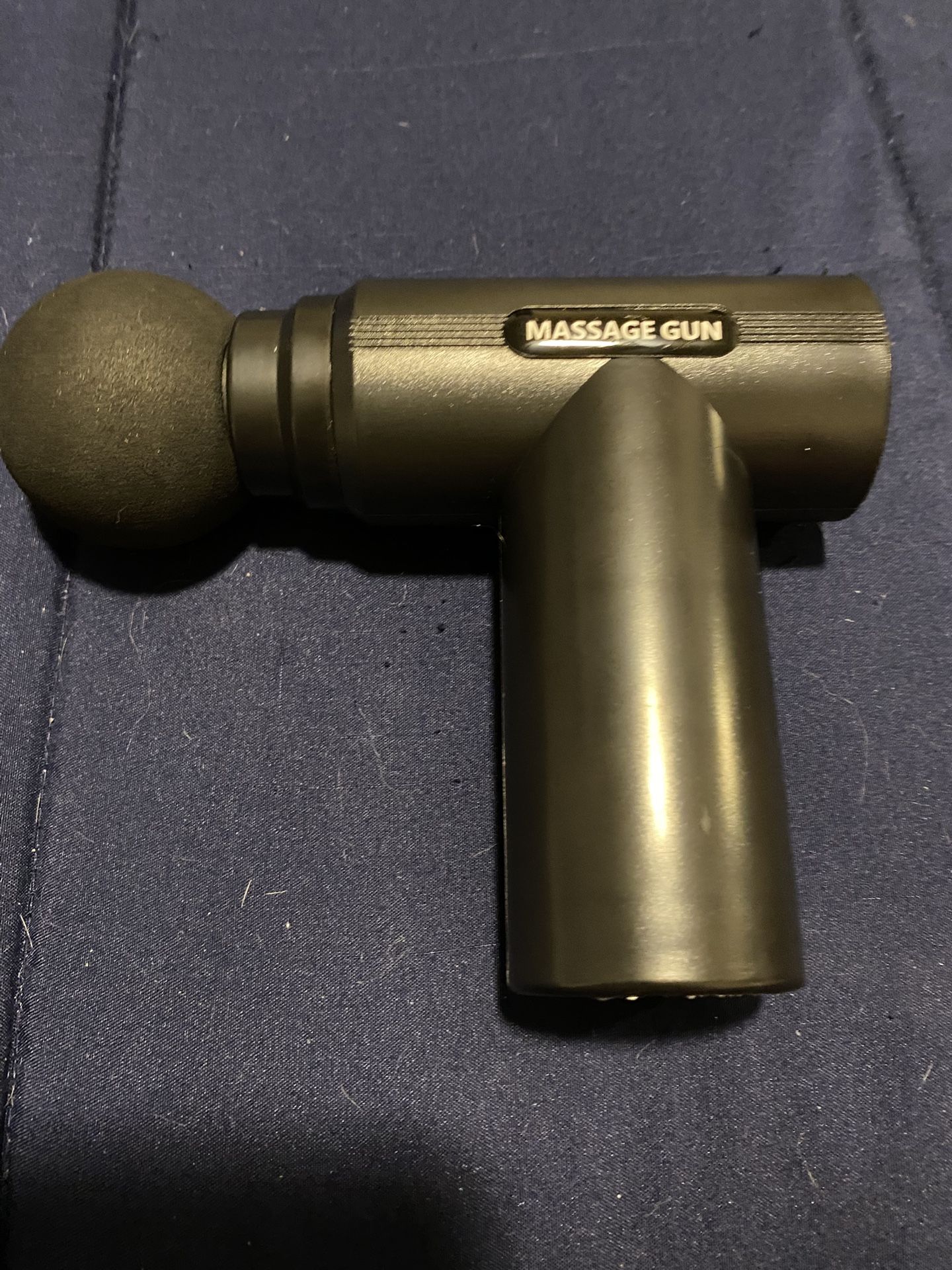 Hand held massage gun
