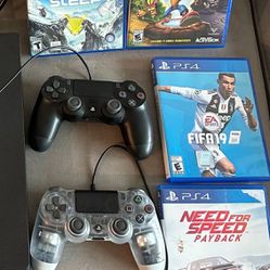 PS4 With 2 controllers And 4 Games