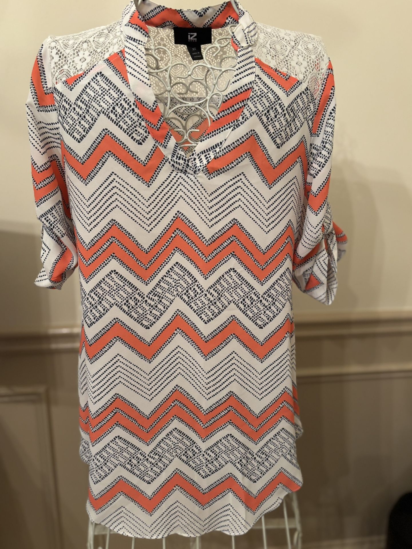 Iz Byer Orange and Black Chevron Blouse