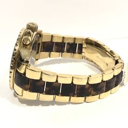 $375- Michael Kors Gold Tone Baguette Bezel Watch Chocolate  display picture 1