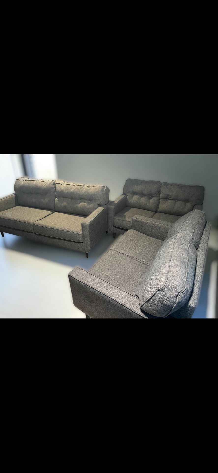Ashley® Zardoni Charcoal 3 pieces Charcoal living room sets.