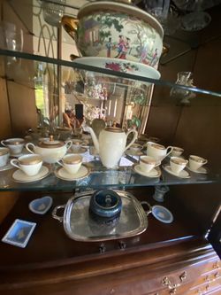 Demitasse coffee pot, cream, sugar and 12 cups and saucers