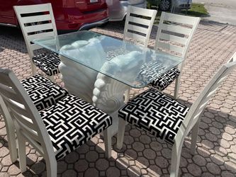 Dinning Table With 6 Chairs  (Glass 50”W x 28”D x 30”H) Used But Good Condition $130 Firm on Price