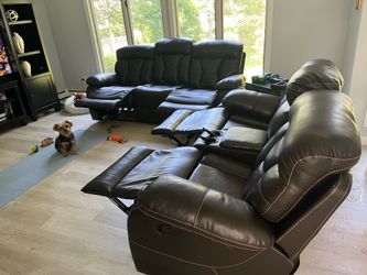 Reclining Sofa & Loveseat Set – Black Leather  Matching reclining living room set, great condition!