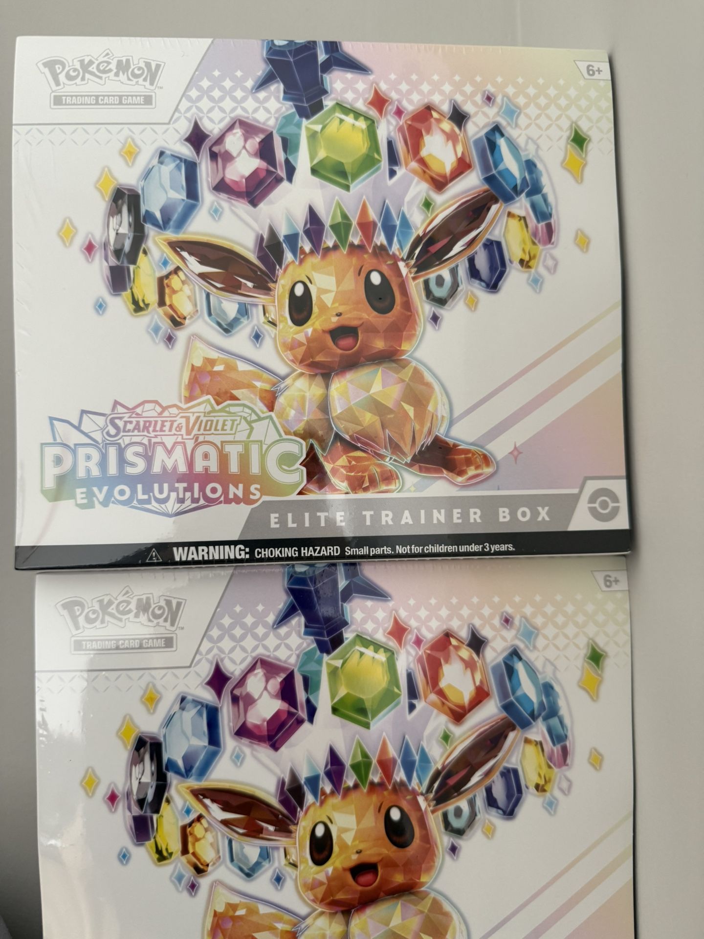 Pokemon Prismatic Evolutions Elite Trainer Box