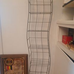 wavy skinny metal shelf