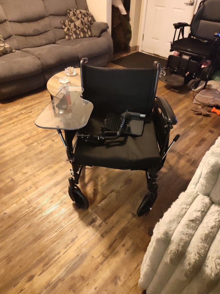 Wheelchair with arm table