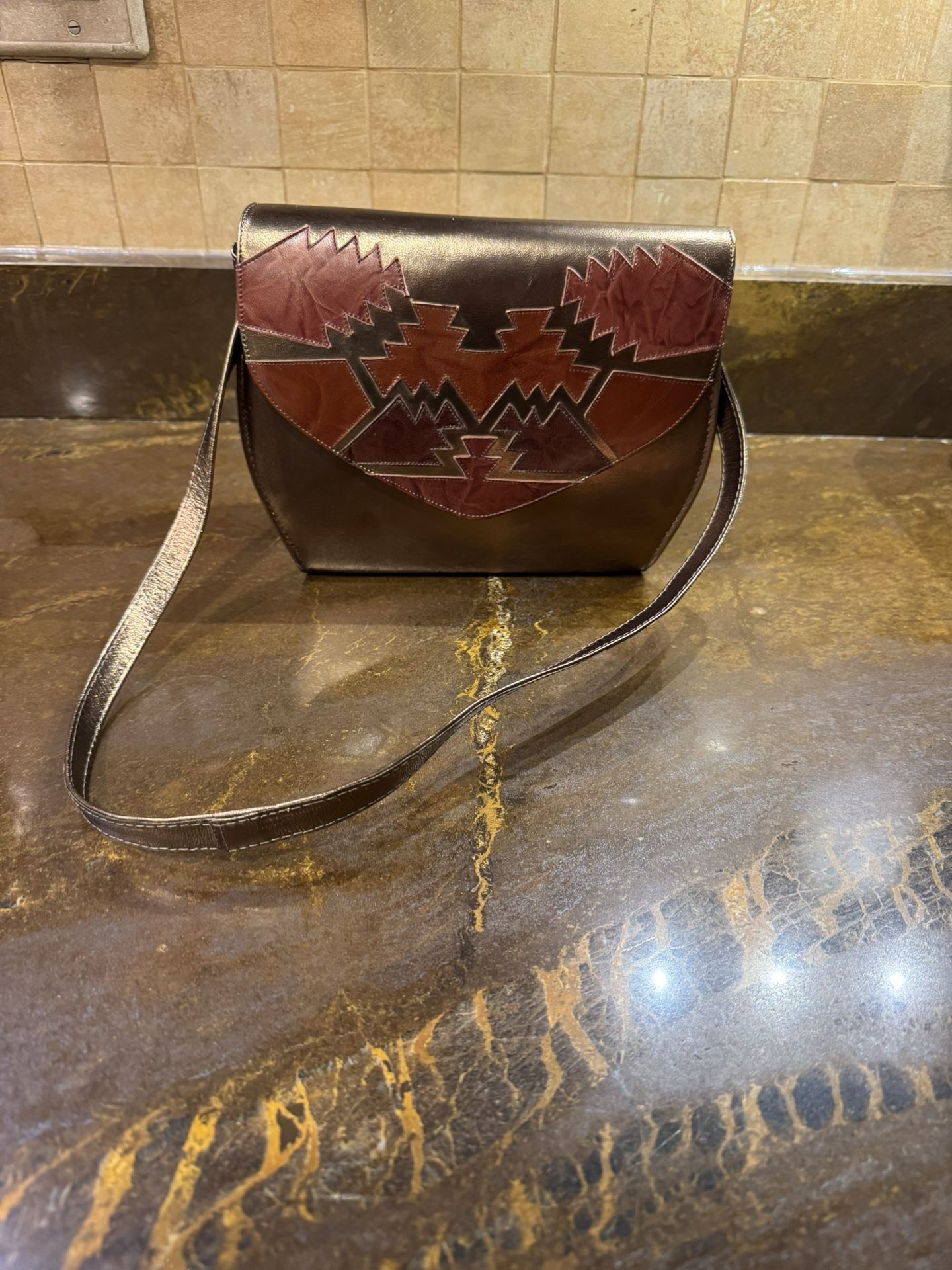 Women’s Bronze metallic w/aztec design flap over handbag/purse unbranded