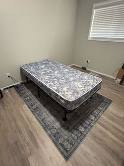 Free twin mattress and folding metal bed frame
