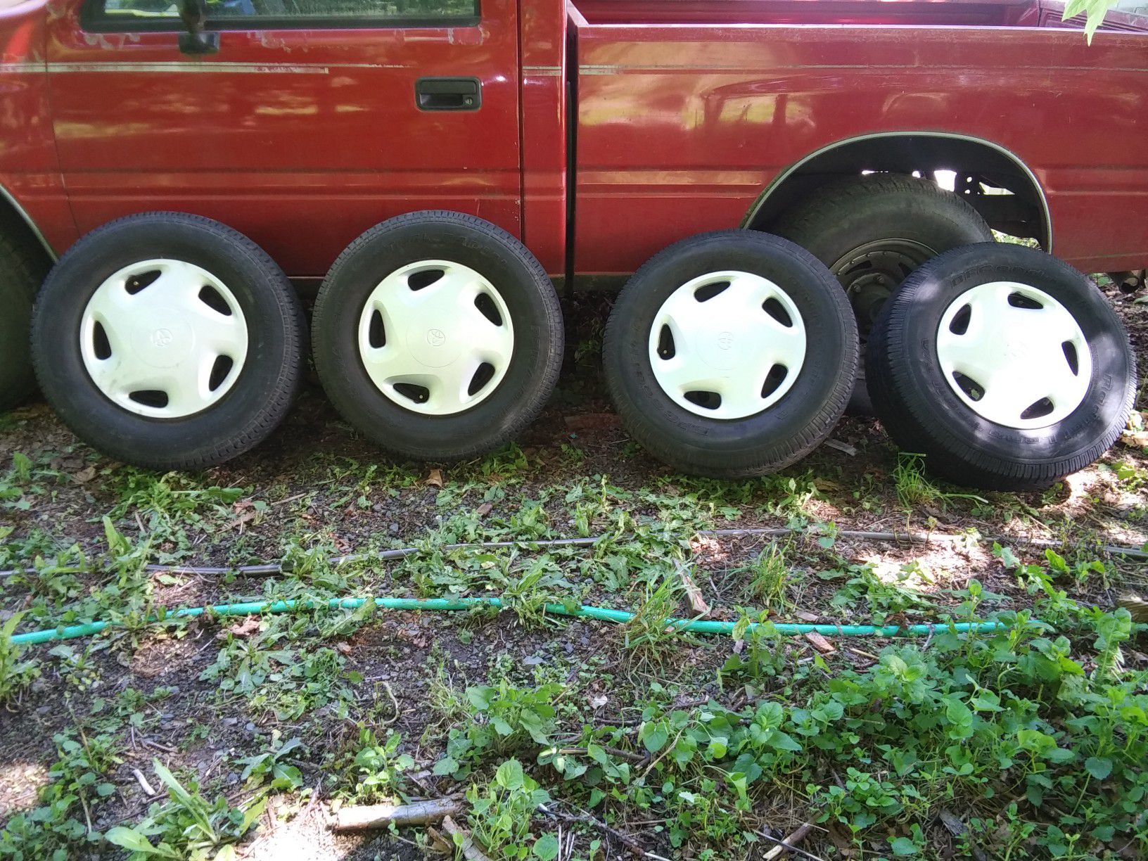 5 lug toyota tires+ rims + covers +good tred