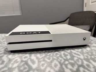 x box one S with 10 games and 3 controllers
