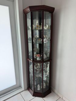 Curio corner cabinet