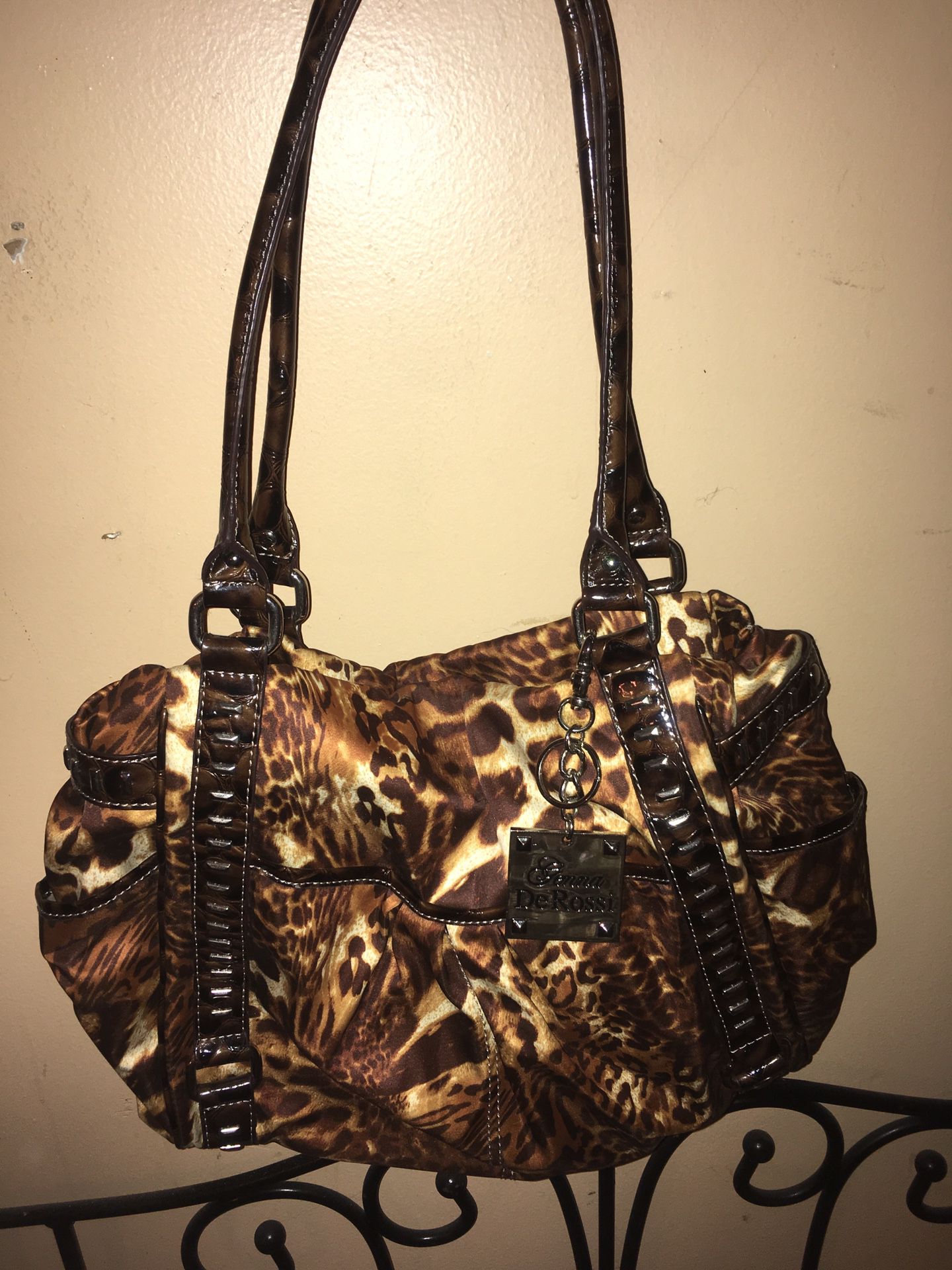 Genna DeRossi leopard print purse