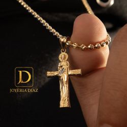 Gold cross pendant