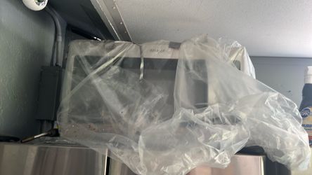 Used almost new whispool 30” over oven microwave