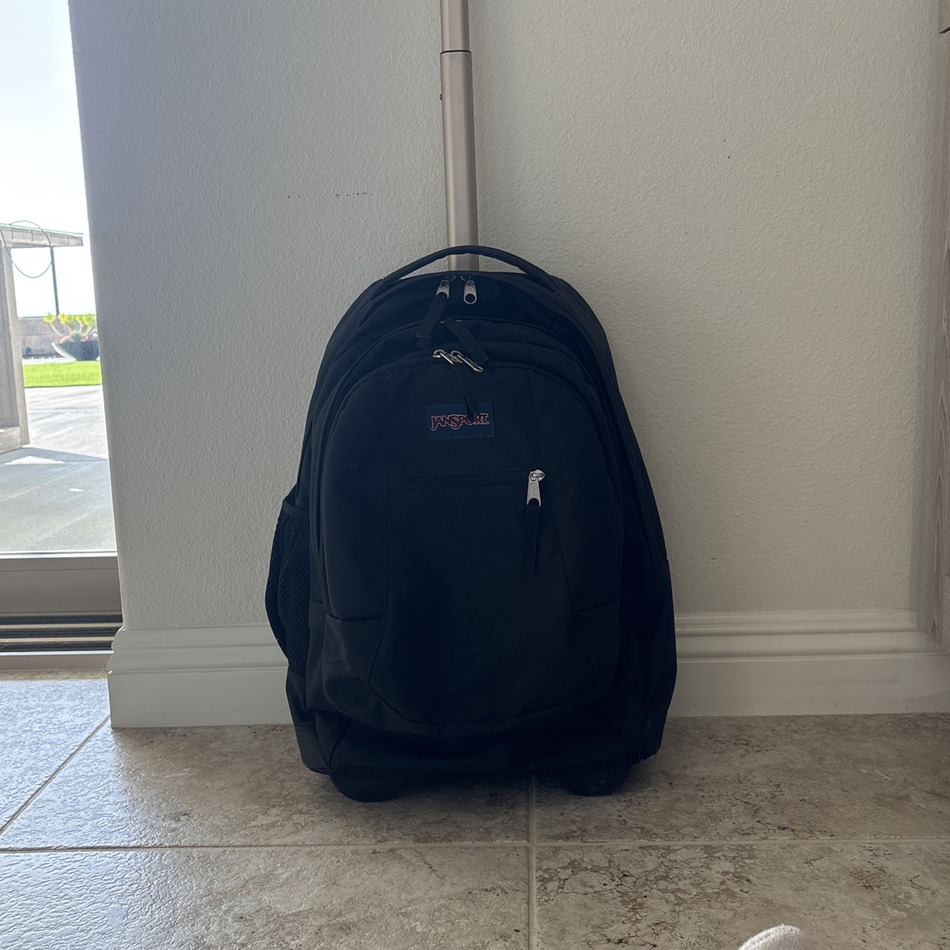 Lightly Used Jansport Roller Backpack