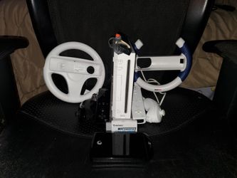 Nintendo Wii With 2 Wiimotes, 2 Wheels, Hdmi Adapter and Lots Of Games