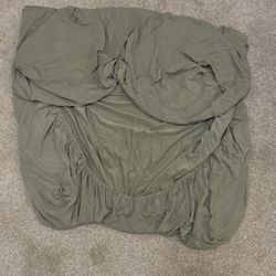 Caden Lane solid moss bamboo knit crib sheet