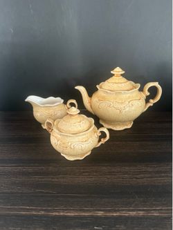 Vintage  Yellow Coffee/Tea Pot with Lid, Sugar Bowl with Lid, and Creamer.