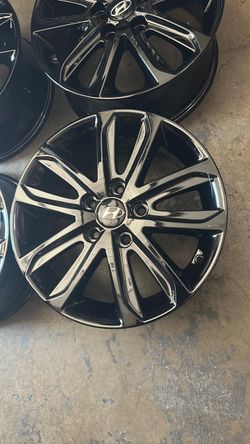 16” Hyundai Elantra rims gloss black firm price,,