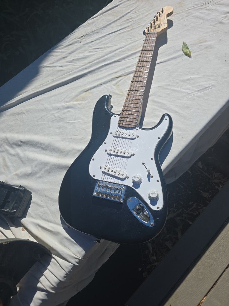 Squire mini fender Guitar. No amp or cord