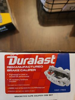 Bracketed Caliper And Brake Pads