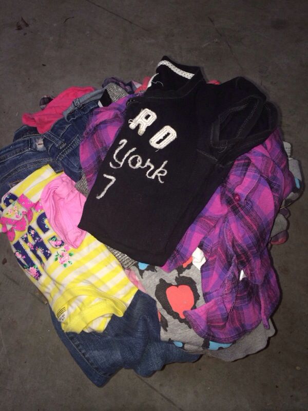 Large box filled with clothing kids clothing adult and teens