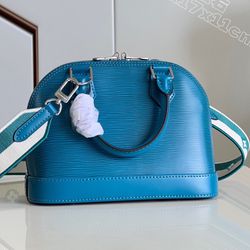 Louis Vuitton Alma Compact Bag