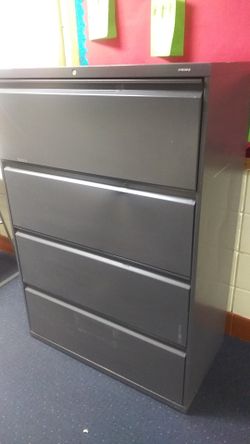 Hon four draw tall filing cabinet