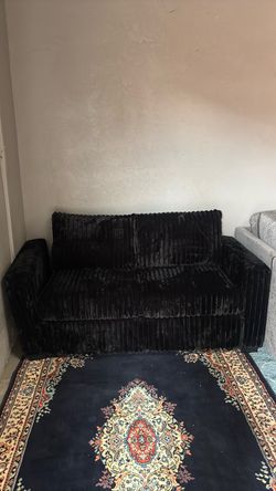 Black corduroy loveseat