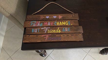rustic hanging wooden slat sign
