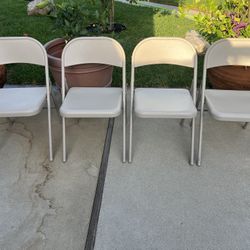 4 Beige Metal Finding Chairs