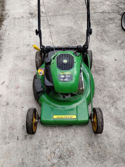 John deer self propelled mower in working condition selling ASIS
