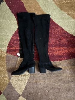 Thigh high black boots