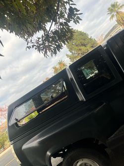 Matte Black camper for a 1996 Chevy Cheyenne
