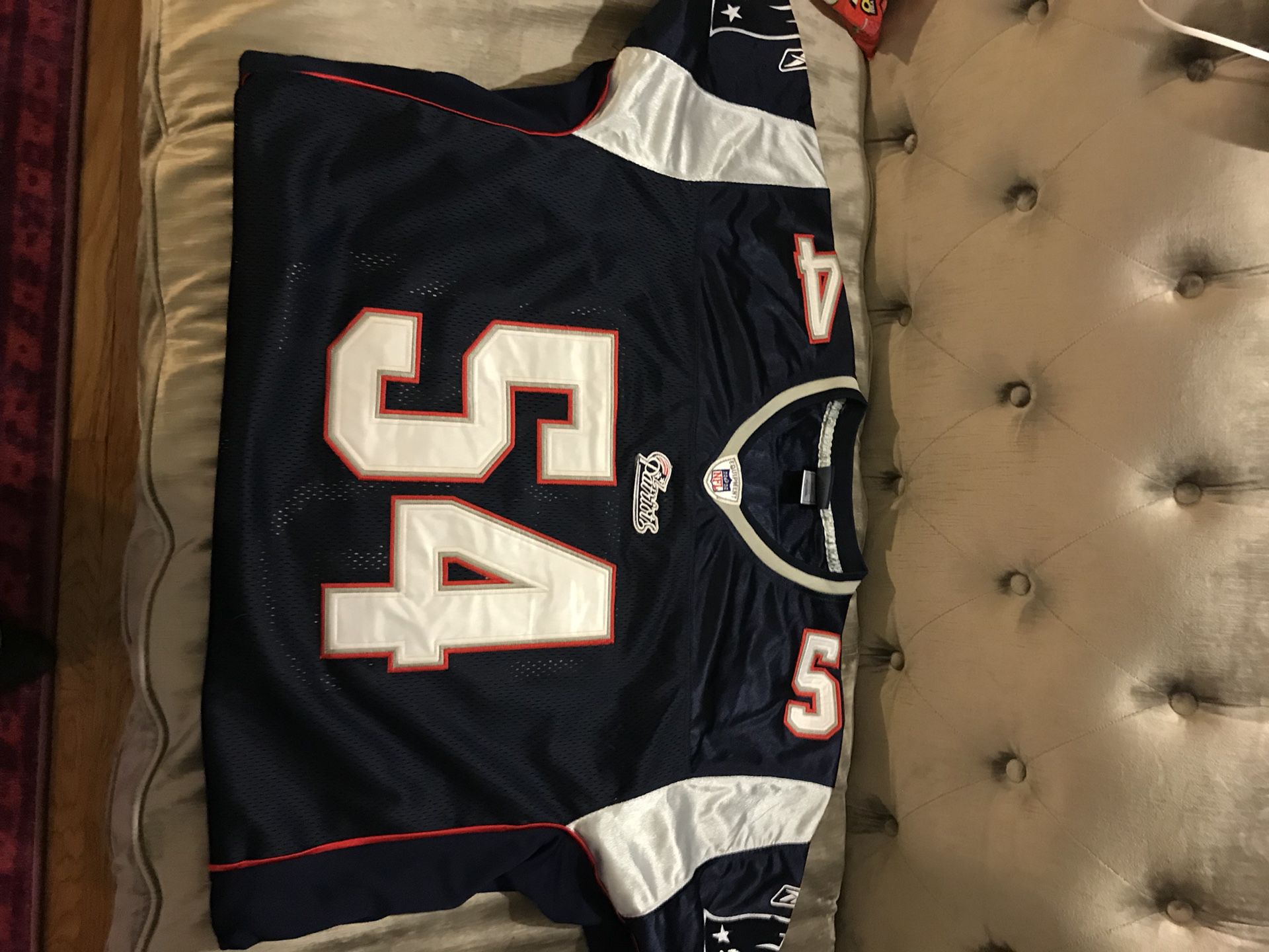 New England PATRIOTS AUTHENTIC SIZE 54 MENS authentic double stitched numbers and letters unworn navy blue jersey men’s 54 yours for 100.00