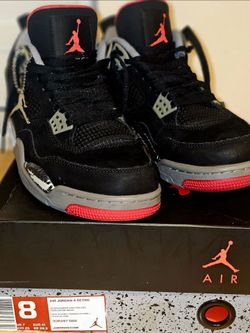 Used Air Jordan Retro 4s size 8 with damages