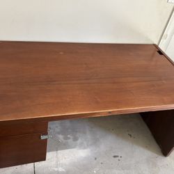 Moving sale — selling a sturdy desk.